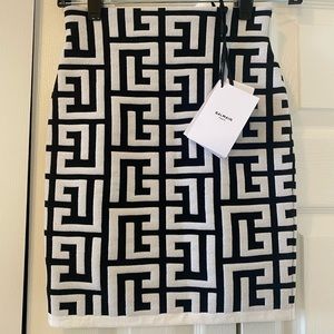 Maxi Monogram Jacquard Wool Blend Miniskirt
BALMAIN